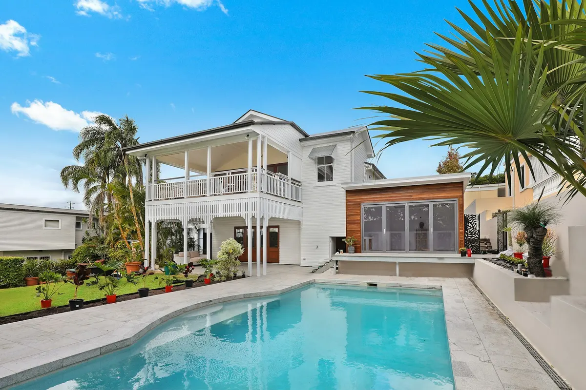 Well-maintained rental homes with fresh landscaping and connected driveways